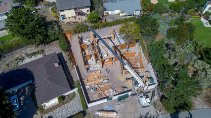 Aerial view of construction site with crane operating