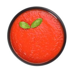 Delicious tomato cream soup isolated on white, top view