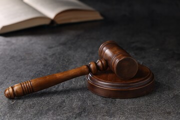 Law concept. Judge's gavel on grey textured table