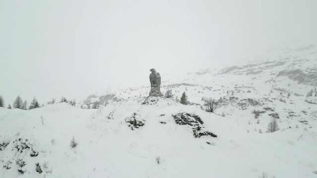 Snowstorm in the Alps. Landmark of Switzerland. Eagle made of stone. Aerial Shots by Snow