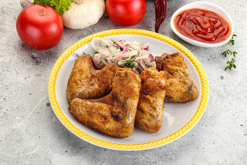 Grilled chicken wings with sauce