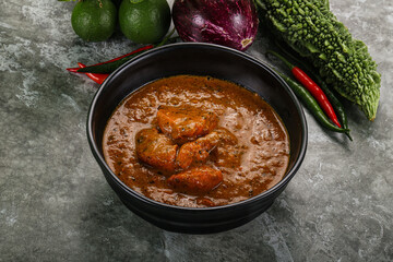 Indian cuisine - chicken curry with spices