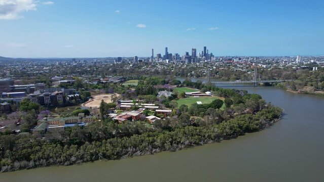 Playing Fields On The Banks Of Brisbane River Near Eleanor Schonell Bridge In Queensland, Australia. aeria panning shot