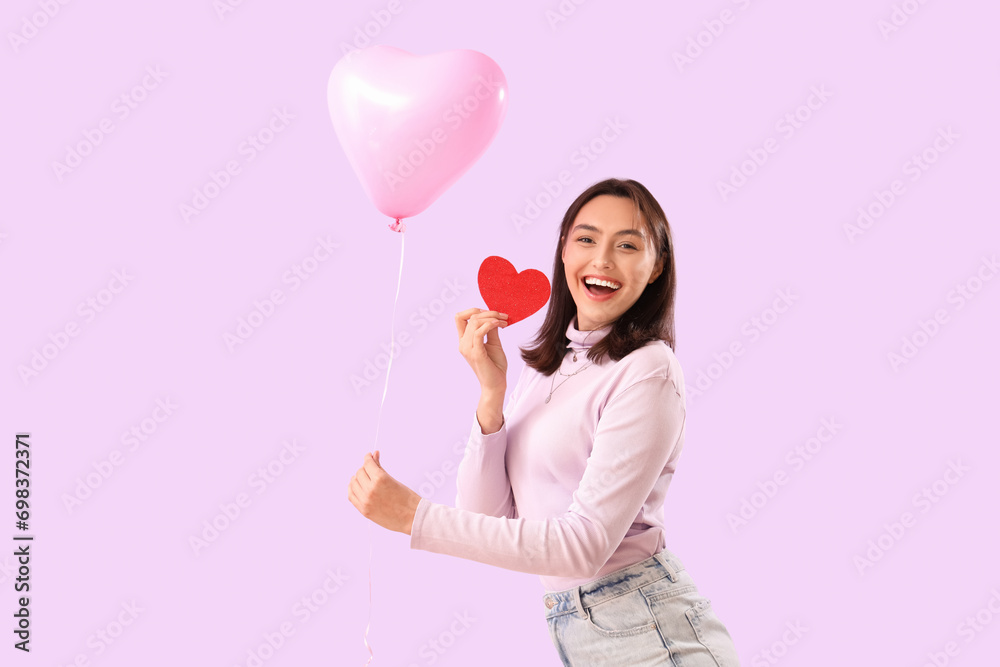 Sticker Young woman with paper heart and balloon on lilac background. Valentine's Day celebration