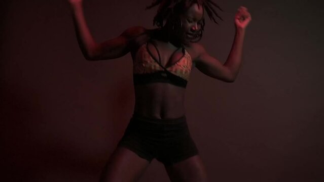 Slow motion of powerful black woman dancing choreography