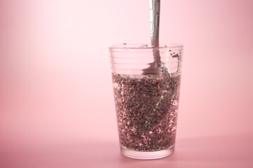 close up of chia seeds in a glass of water 
