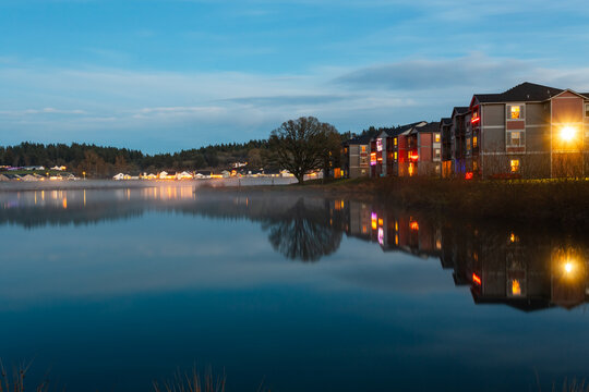 Turner Lake lights reflections in dusk in Turner, Oregon