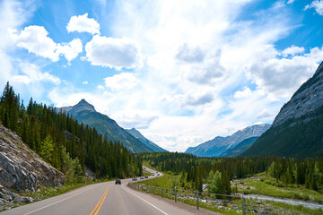 Beautiful view from a car on the Rocky Mountains in Banff National Park in Alberta. Panorama of a...