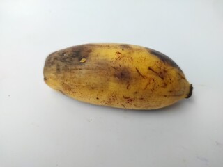 almost rotten banana isolated on white background