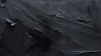 A close-up of an abstract black textured surface, creating an artistic and moody background. - obrazy, fototapety, plakaty