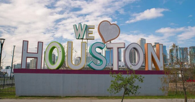 Time lapse of cloudy sky over the 'We Love Houston' Sign in Houston, Texas