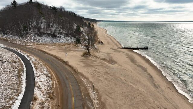 The snowy and cold coast of Lake Michigan in December.