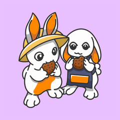 A pair of rabbits eating cake