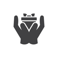 Gift box in hands vector icon