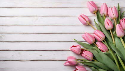Obraz na płótnie Canvas Pink Tulips on white wooden background with copy space