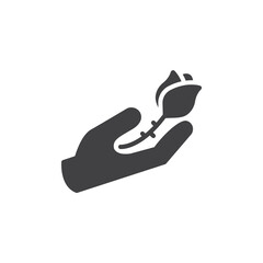 Rose flower in a hand vector icon
