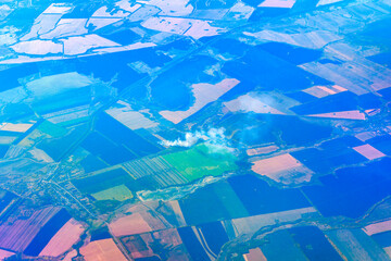 Forest and field fire, top view. Straw burns, emergency.  Burning dry grass meadow due arid climate...