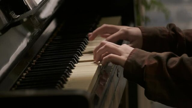 Girl's hands plays gentle classical music on old vintage piano. Piano Keys Piano lesson, Pianist, Music. Cinematic 4k