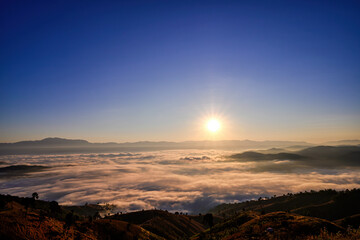 Scenery of a Misty morning in the mountains at Ba Lu Kho view piont, Mae Chaem, Chiang Mai in northern Thailand.