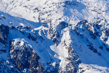 The mountains of the Mont Blanc massif in Europe, France, Rhone Alpes, Savoie, Alps, in winter on a sunny day.