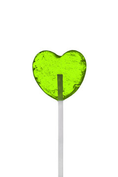 green lollipop heart shape on a transparent background or PNG file. Clipping path. Heart candy sucker on stick, romantic sweet gift. Love symbol. Valentine's day, Mother's Day.