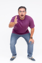 A frustrated man leans forward and debates with someone very stubborn. Arguing while looking very...