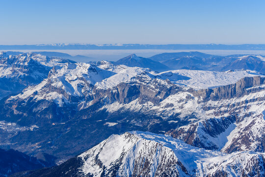 The Aiguillette des Houches and Platé desert in Europe, France, Rhone Alpes, Savoie, Alps in winter on a sunny day.