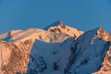 Mont Blanc summit at sunset in Europe, France, Rhone Alpes, Savoie, Alps, winter.