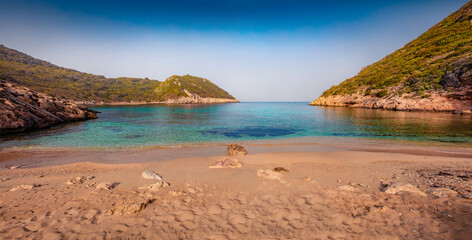 Sandy beach on Pirates Bay, Porto Timoni, Afionas village location. Amazing morning seascape of...