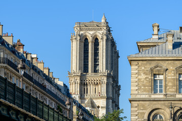 The Pont d Arcole and Notre Dame de Paris cathedral , in Europe, France, Ile de France, Paris, Along the Seine, in summer, on a sunny day. - obrazy, fototapety, plakaty