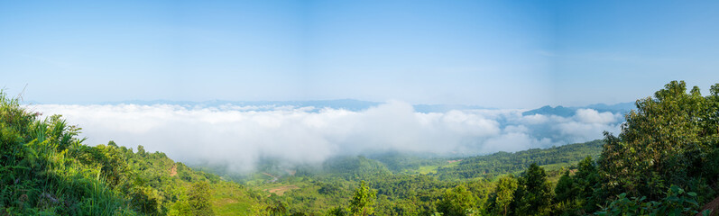 The clouds above the city seen from the green mountains , in Asia, Vietnam, Tonkin, Dien Bien Phu,...