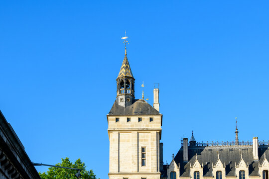 The Clock Tower of the Palais de la Cité , Europe, France, Ile de France, Paris, in summer on a sunny day.