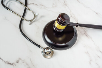 Judge Gavel and stethoscope. Medical law, medical negligence ruling.