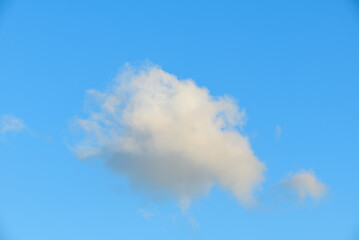 Fototapeta na wymiar A cloud in Europe, in France, in Burgundy, in Nievre, towards Nevers, in Spring, on a sunny day.
