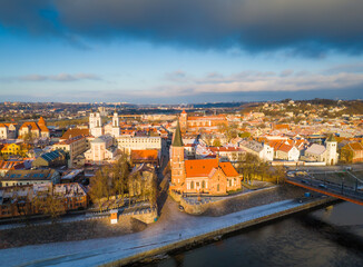 Fototapeta na wymiar Aerial view of Kaunas old town in winter. Drone view of city center and Vytautas Magnus church