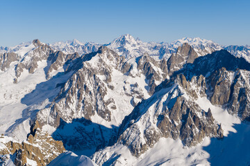 Le Grand Combin and Mont Cervin in Europe, France, Rhone Alpes, Savoie, Alps, in winter on a sunny day.