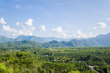 The green mountains and wooded valleys, in Asia, Vietnam, Tonkin, between Son La and Dien Bien Phu, in summer, on a sunny day.