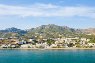 The paradise coast and the sandy beach at the foot of the mountains, in Europe, Greece, Crete,...