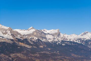 The panoramic view of the Chaine des Fiz in Europe, France, Rhone Alpes, Savoie, Alps, in winter, on a sunny day.