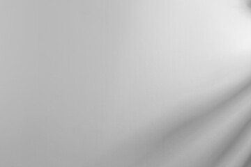 Light and shadows on white wall, space for text