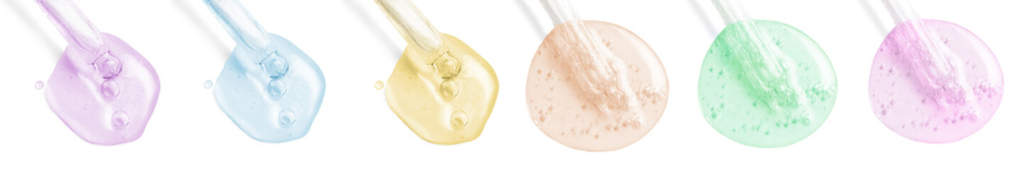 Droppers with serum on white background, top view. Skin care product