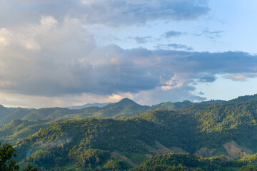 The green mountains in the tropical countryside, Asia, Vietnam, Tonkin, Dien Bien Phu, in summer, on a sunny day.