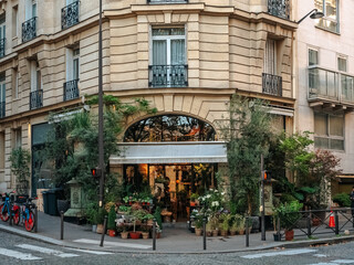 Flower shop on the corner of a house in the center of Paris