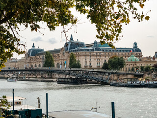 The Seine embankment in the center of Paris. View of the Orsay Museum (Musée d'Orsay)