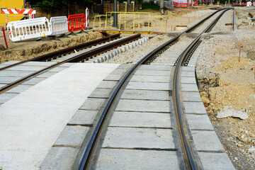 Laying new tram rails on new concrete sleepers with pads that reduces vibration and noise emission