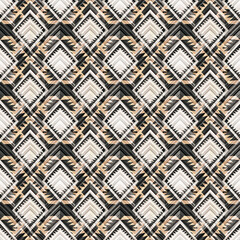 Seamless ethnic pattern. White, beige ornament on a gray background.