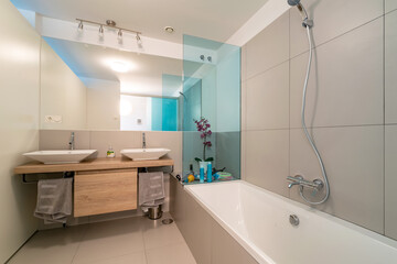 an image inside a mediterranean holiday home of a twin washbasin bathroom
