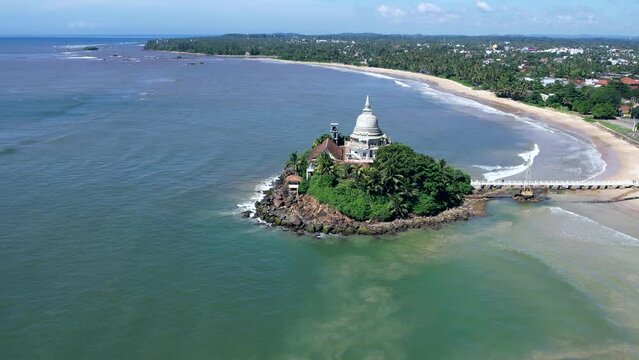 Golden Island on the coast of Sri Lanka in Matara. Top view, aerial video filming.