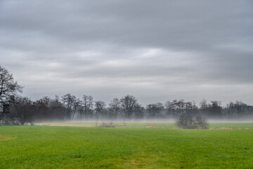 wafts of fog in the mountains of Austria