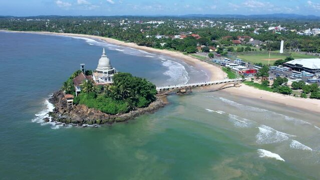 Golden Island on the coast of Sri Lanka in Matara. Top view, aerial video filming.
